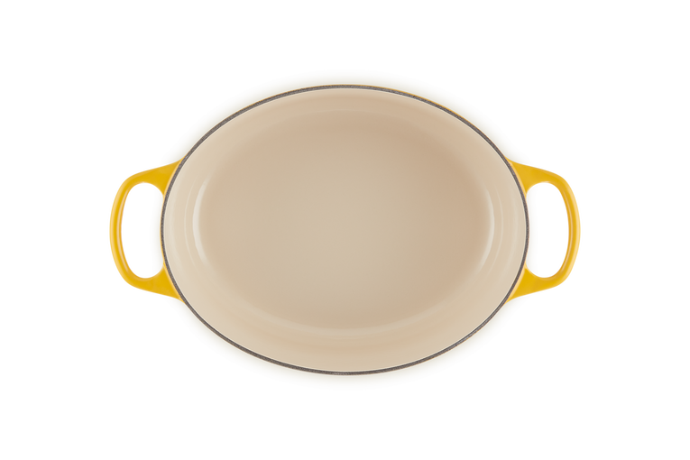 Le Creuset Oval Casserole 27cm in Nectar orange, durable cast iron cookware – available at Keans Claremorris.