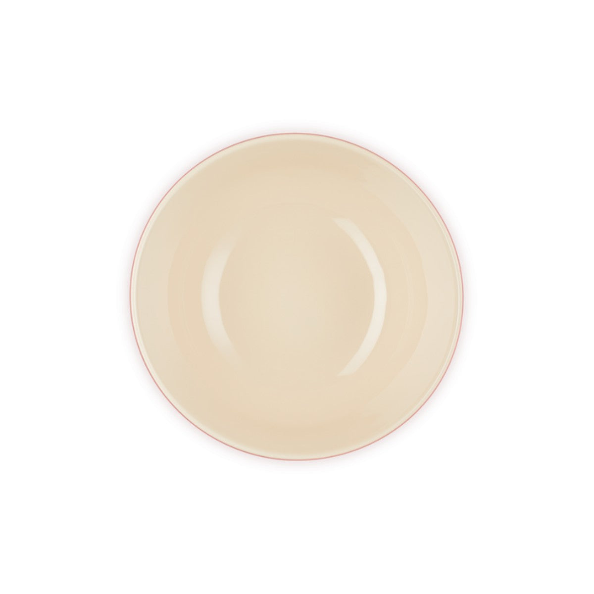 Top view of a cream mixing bowl with a thin cerise rim from Le Creuset Christmas Holly collection.