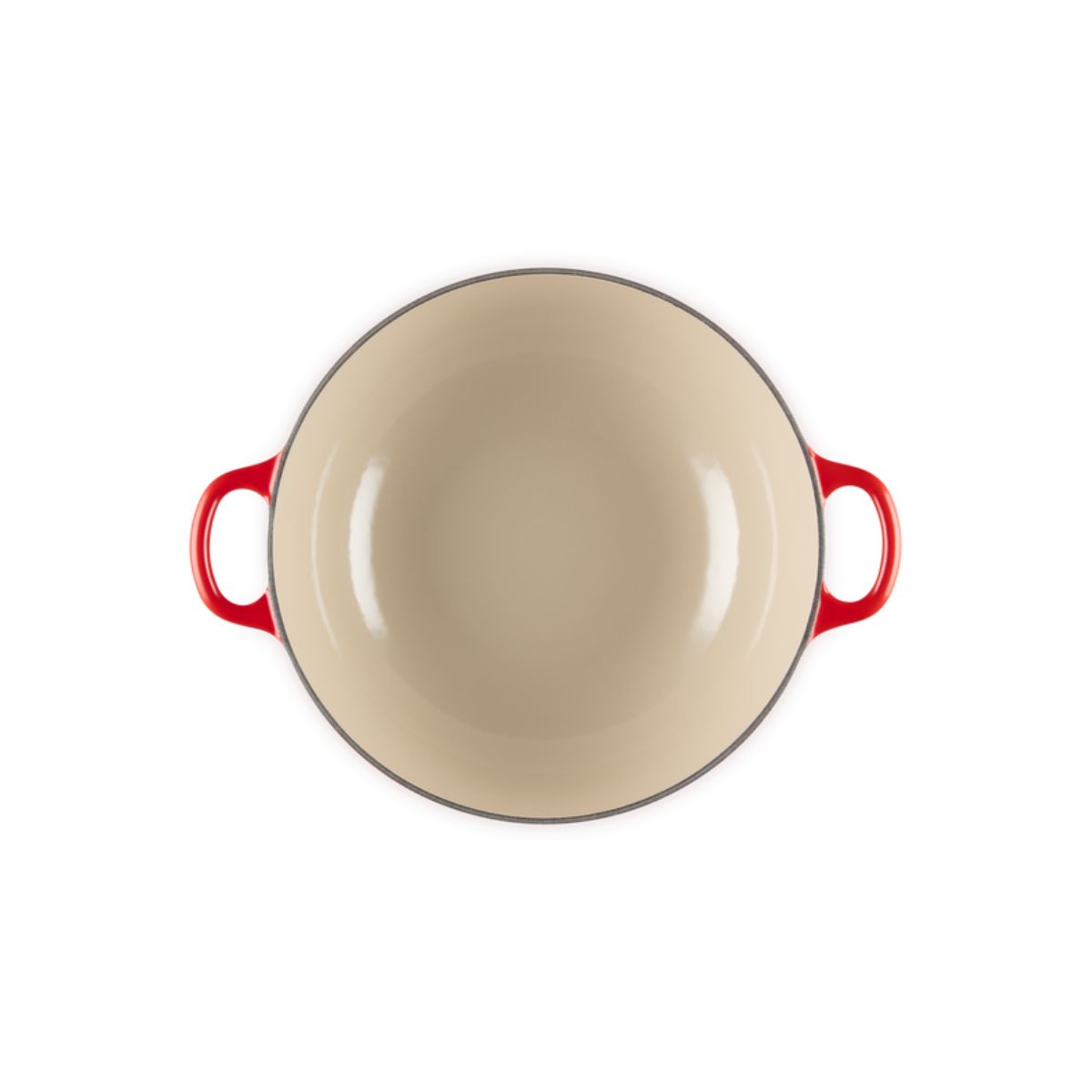 Top view of Le Creuset Christmas Soup Pot Holly Cerise showing cream interior and red handles