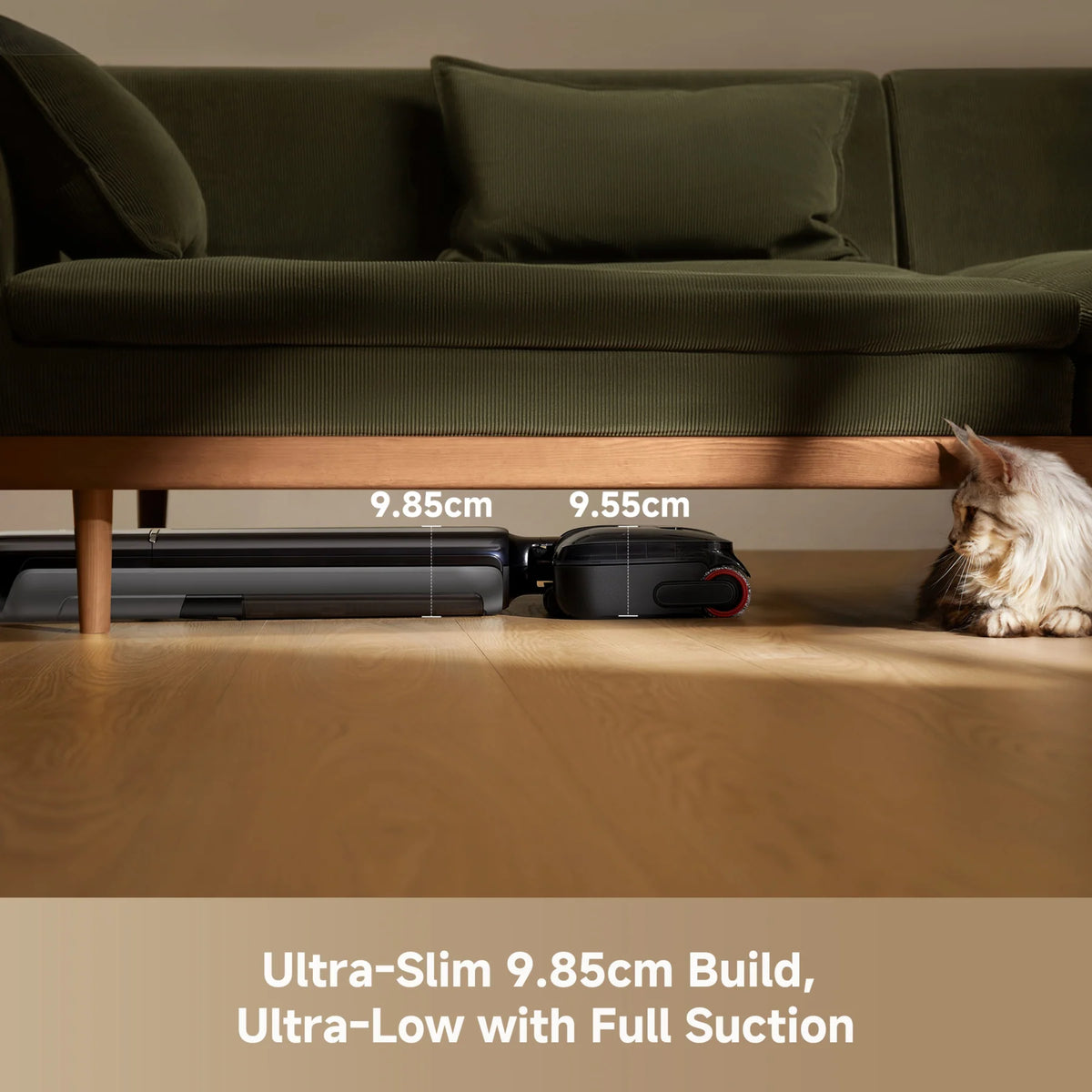 Dreame T12 Pro cordless vacuum shown slim enough to fit under a green sofa with a cat nearby.