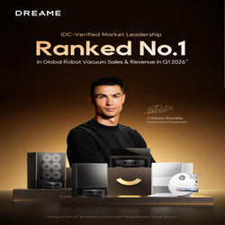 Promotional graphic for Dreame robot vacuums featuring Cristiano Ronaldo as a creator and global ambassador. The image shows a man in a black shirt standing behind a display of various Dreame vacuum cleaners, with text at the top reading 'Ranked No.