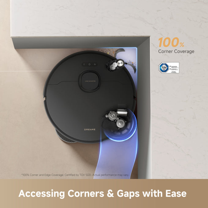 Black robot vacuum cleaner on a tiled floor with text about corner coverage and TUV SUD certification.