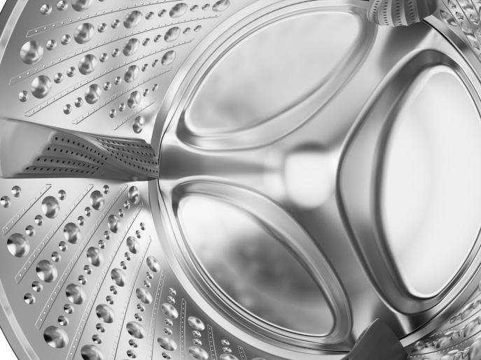 Close-up view of the stainless steel drum interior of the Hisense 10kg washing machine.