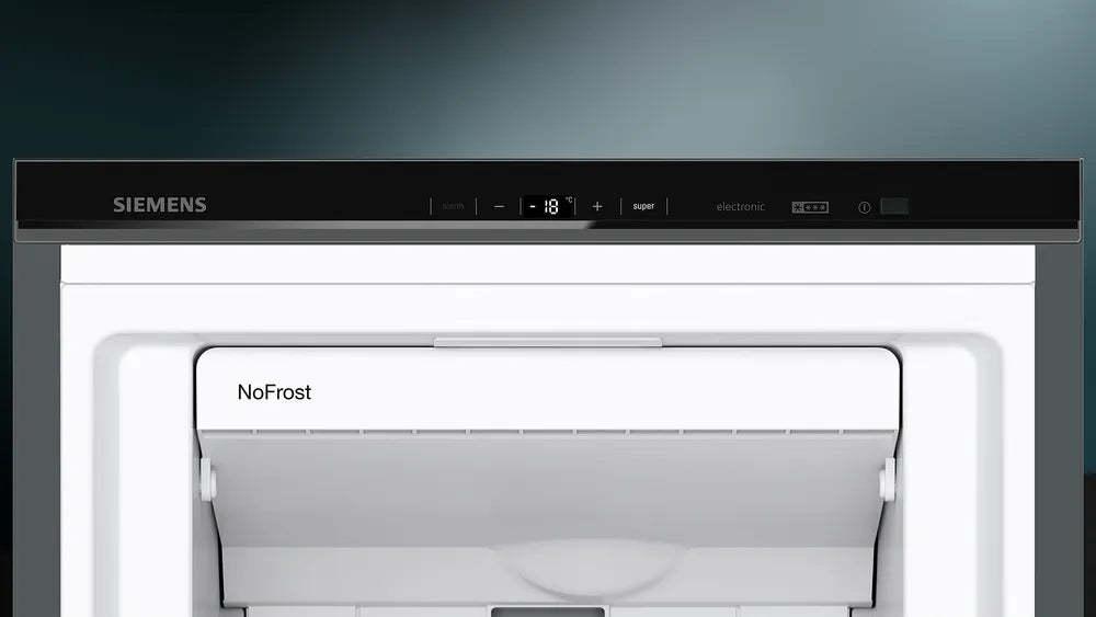 Close-up of Siemens IQ500 freezer control panel showing digital temperature display at -18°C and NoFrost compartment door.