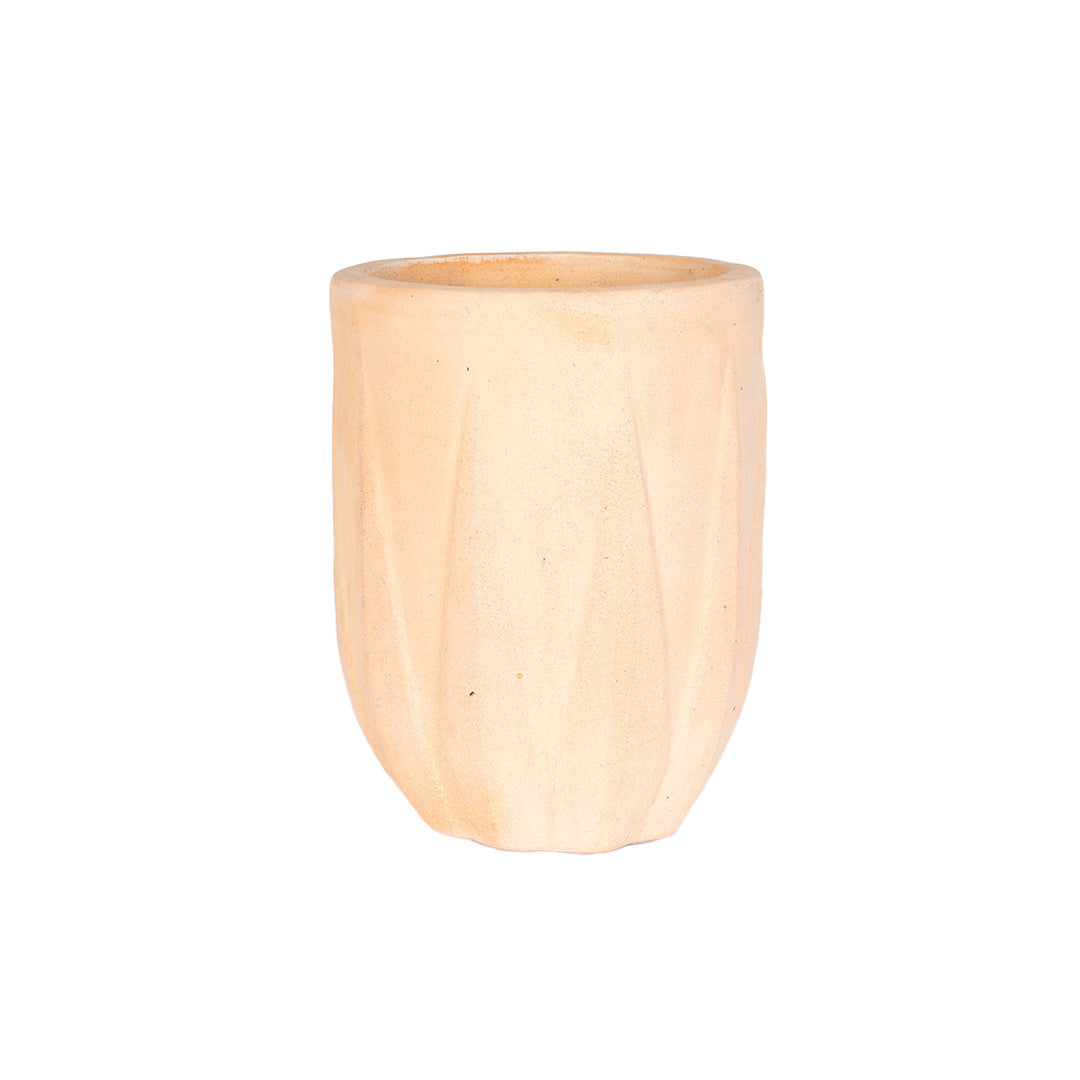 Aloe Egg planter in terracotta with a smooth, ridged surface and soft peach finish, front view.