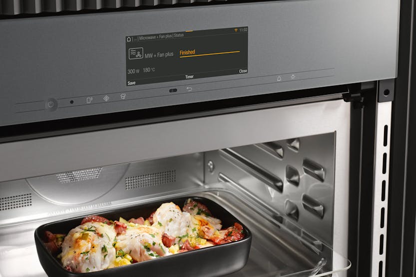 Miele H7240BM built-in compact microwave combination oven, sleek design, Keans Claremorris store.