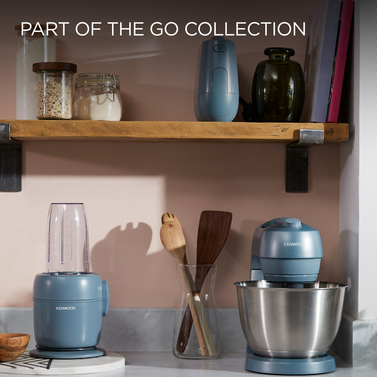 Kenwood Multipro Go Blend Food Processor in storm blue with blending jar and stainless steel mixing bowl on kitchen counter.