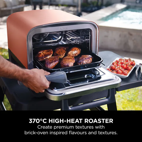 Ninja Woodfire Electric Outdoor Oven Terracotta OO101UK for backyard cooking – available at Keans Claremorris