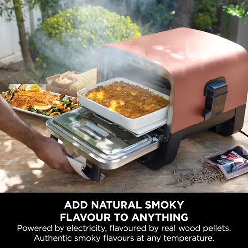 Ninja Woodfire Electric Outdoor Oven Terracotta OO101UK for woodfire cooking, available at Keans Claremorris