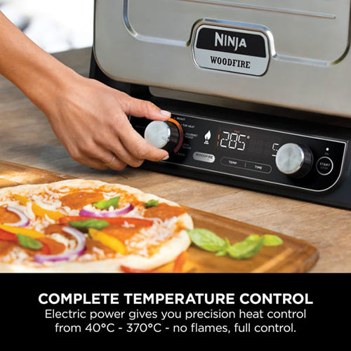 Ninja Woodfire Electric Outdoor Oven Terracotta OO101UK for woodfire cooking – available at Keans Claremorris