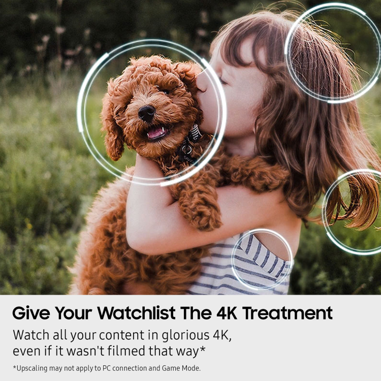 Child holding a brown dog with text about 4K video quality.