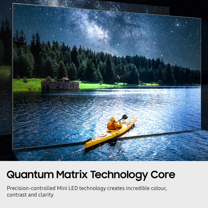 TV screen displaying a scenic view of a person in a kayak on a lake under a starry sky, with text about Quantum Matrix Technology Core.