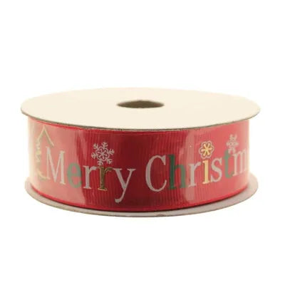 Red fabric ribbon spool with "Merry Christmas" text and festive icons in silver on a bright red background.