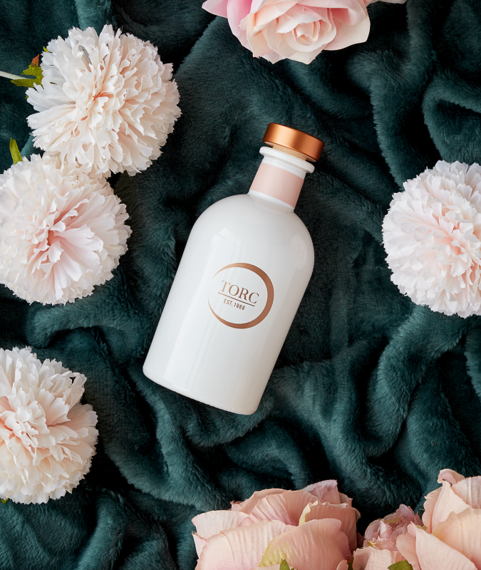 TORC Rose Petal & Cedarwood Diffuser with elegant glass bottle, floral and woody scent – available at Keans Claremorris.