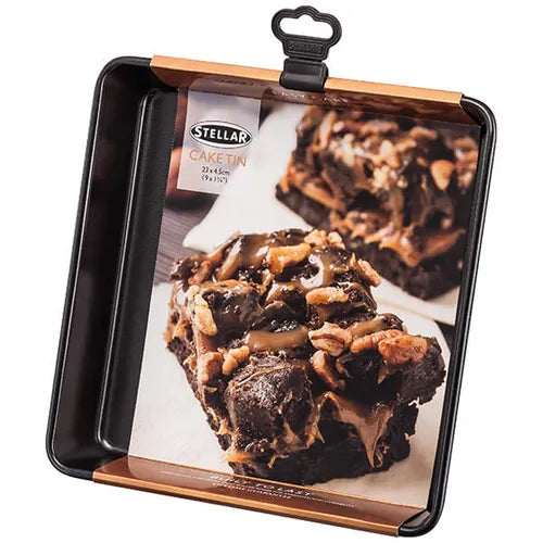 Square non-stick Stellar Bakeware 9-inch springform cake tin with packaging showing chocolate nut brownies.