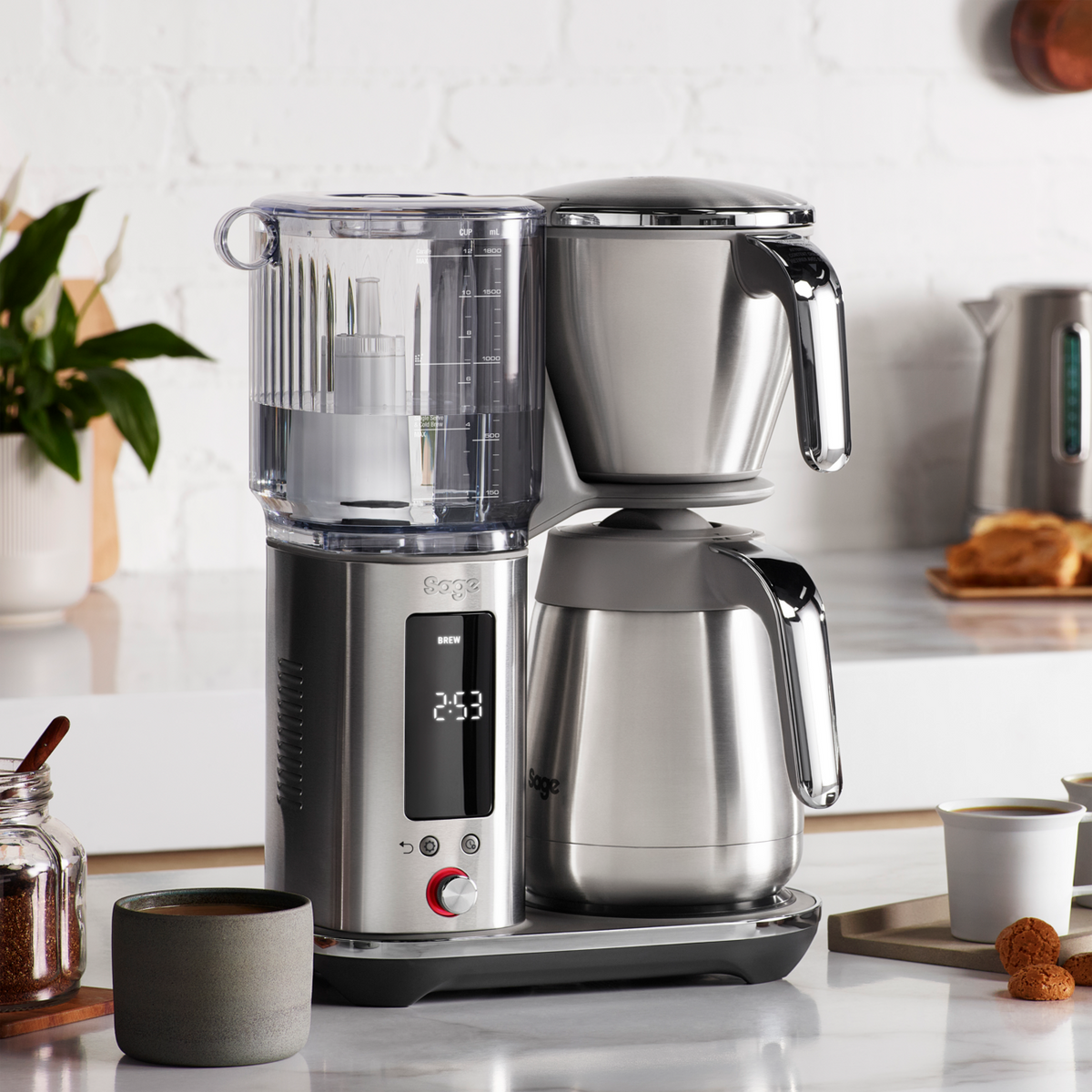 Sage Precision Brewer Thermal in brushed steel with digital display and glass water reservoir on kitchen counter.