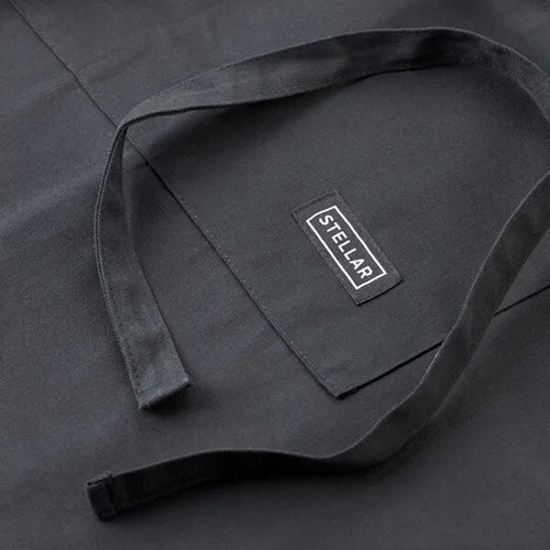Black 55cm waist apron by Stellar Textiles, durable and adjustable, available at Keans Claremorris.