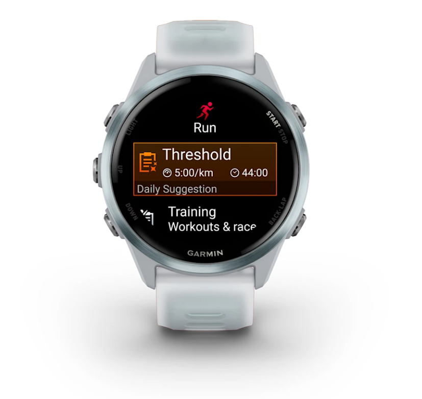 Garmin Forerunner 570 smartwatch in whitestone with cloud blue bezel showing run workout screen with threshold pace and time.