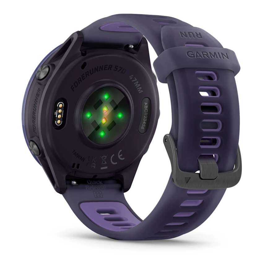 Back view of Garmin Forerunner 570 47mm in imperial purple/indigo showing heart rate sensor and strap details.