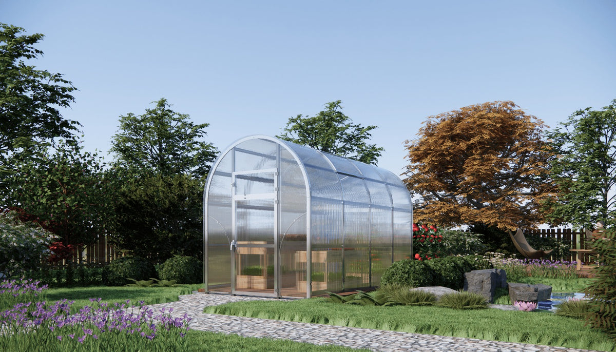 Sigma Lux 2m x 2m greenhouse with 6mm polycarbonate panels in a garden setting on a stone path.
