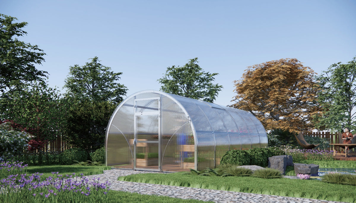 Sigma Lux 3m x 8m greenhouse with 6mm polycarbonate panels in garden setting with plants and stone path.