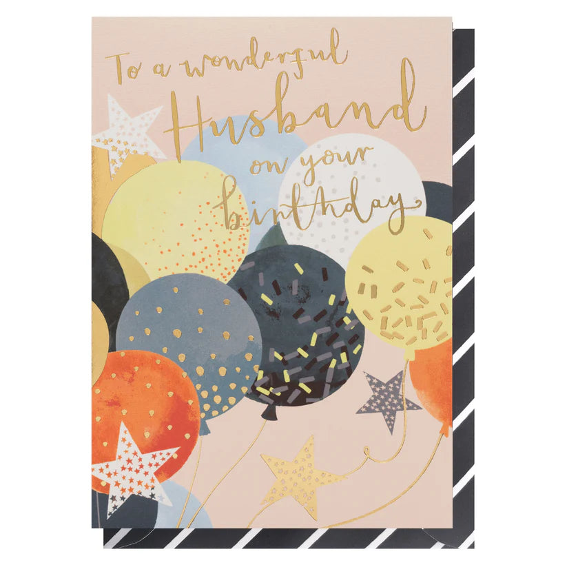 LT Husband Birthday Balloons card with colorful balloons and gold foil text on textured card with striped envelope.