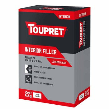 Toupret Interior Filler 2kg box with red, black, and gray design, labeled for interior wall and ceiling repairs.