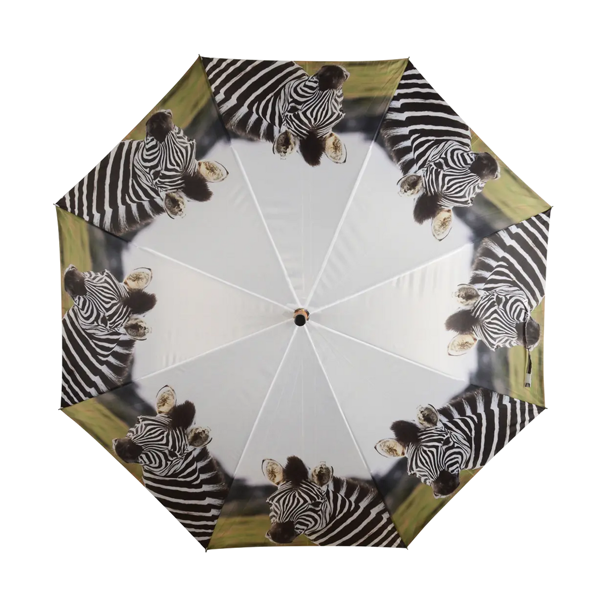 Umbrella with a repeating zebra head pattern around the edges on a white background