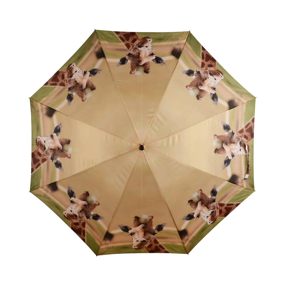 Open umbrella with repeating giraffe head pattern on a beige and green background