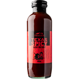 Traeger Texas Spicy BBQ Sauce 440ml glass bottle, sweet smoky spicy flavor, perfect for grilling, available at Kean’s