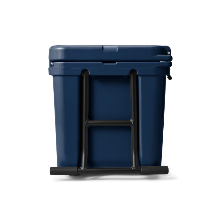 Tundra Haul Navy wheeled cooler shown from the back with black handle and wheels visible