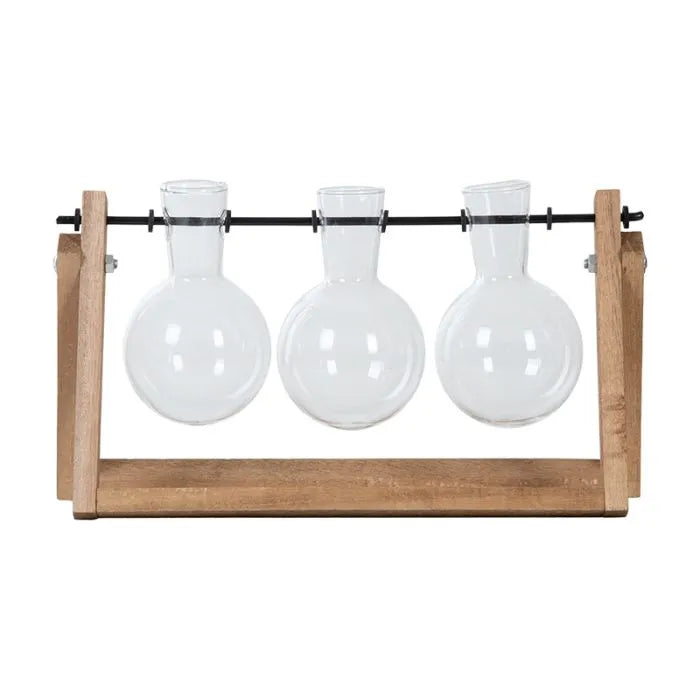 Cutting Vase Set of 3 with round glass vases hanging on a black rod in a natural wooden stand.