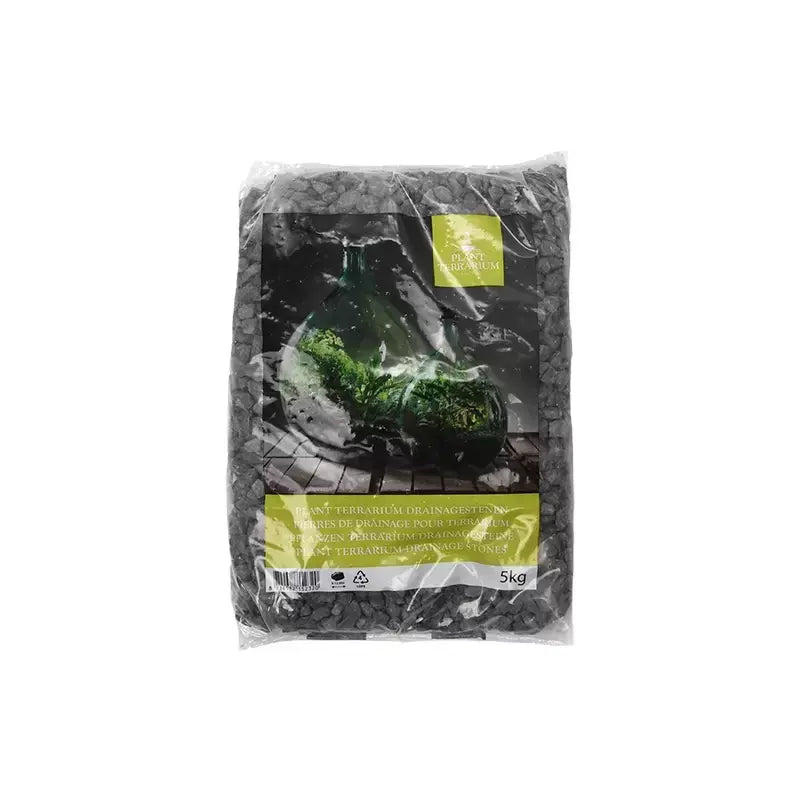 5kg bag of black terrarium drainage stones with label showing a glass terrarium display