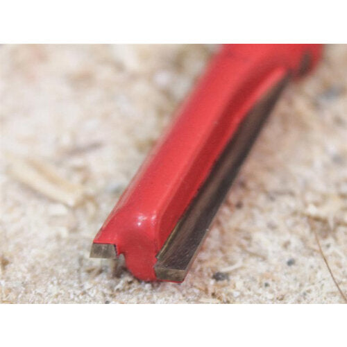 Close-up of a red Faithfull TCT router bit with two flutes on a wood surface.