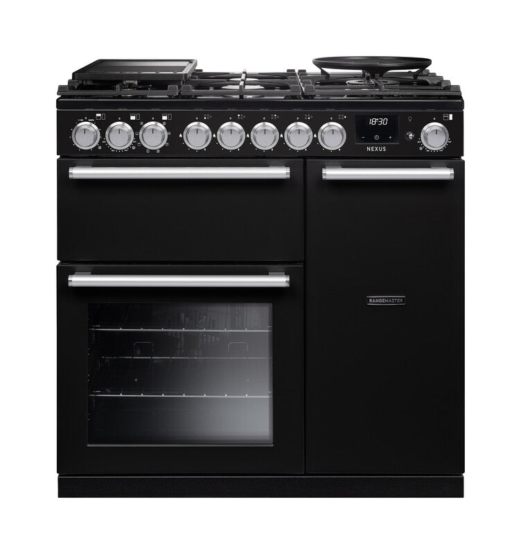 Rangemaster Nexus Dual Fuel 90cm cooker in black with chrome trim, six burners, and double oven doors.