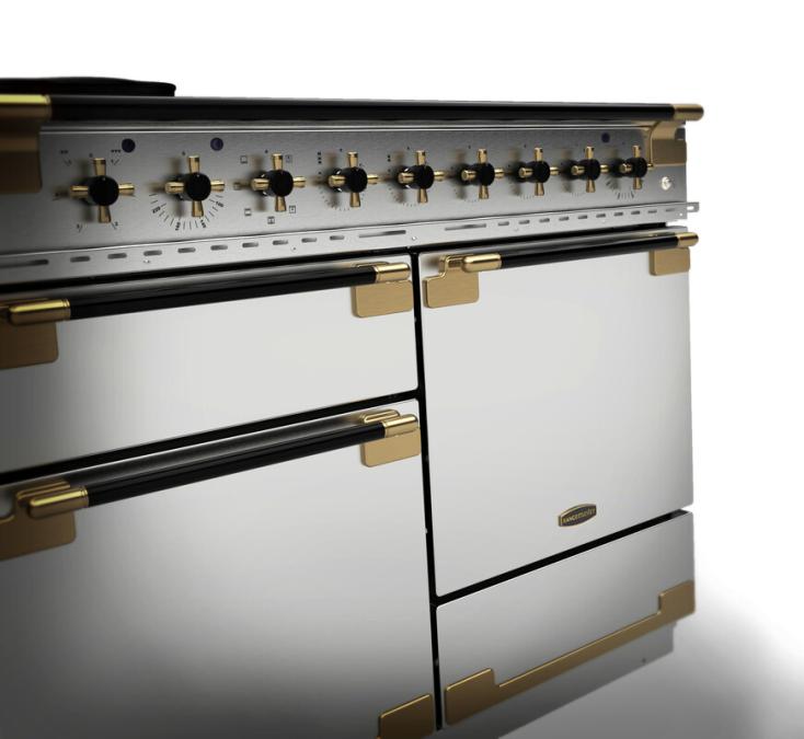 Rangemaster Elise 110cm dual fuel cooker in black with antique brass trim, showing control knobs and oven doors.
