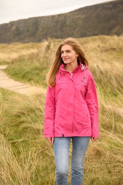 Ladies Beachcomber Coat in Coral, lightweight and stylish outerwear by Keans Claremorris, perfect for beach days.
