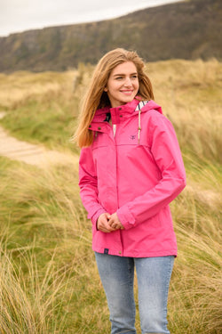 Ladies Beachcomber Coat in Coral - Lightweight, stylish outerwear by Keans Claremorris, perfect for beach days.