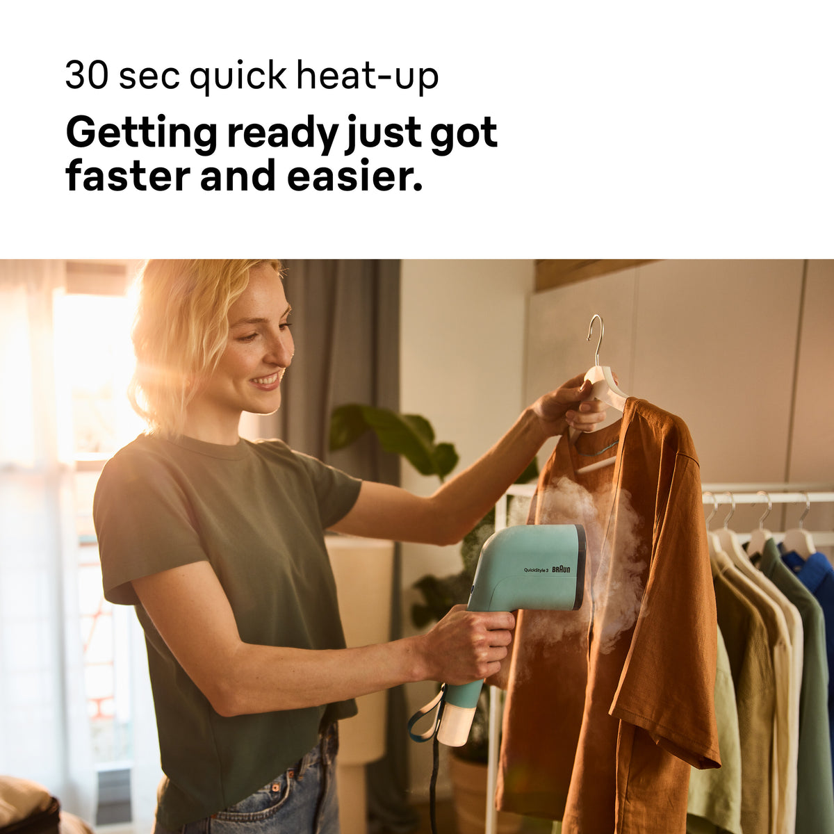 Woman steaming a brown shirt with a Braun Travel Garment Steamer 1200W in a sunlit room