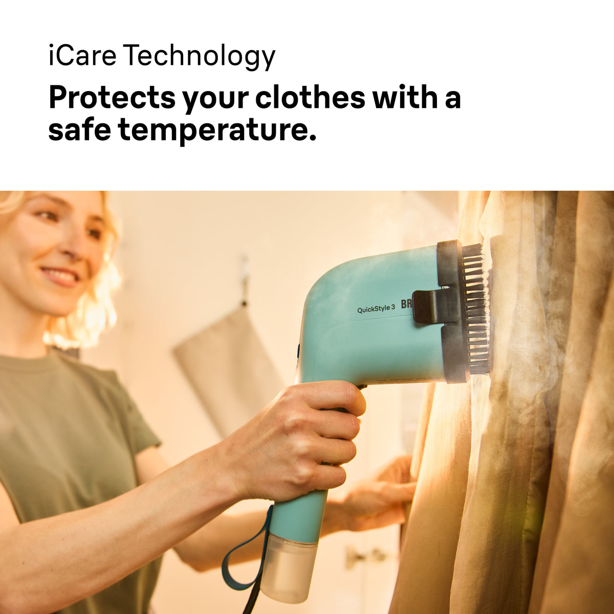 Woman using a turquoise Braun Travel Garment Steamer GS3013GR to steam a beige curtain indoors