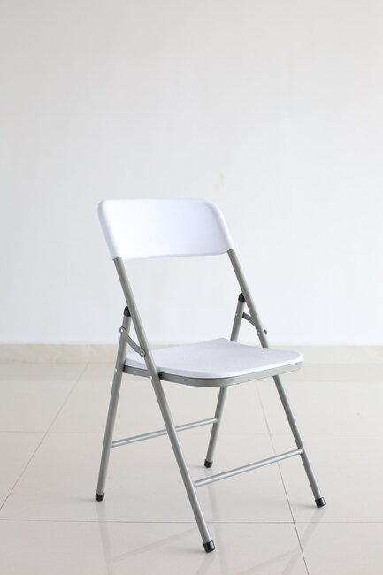 White Party Folding Chair with durable steel frame and resin seat, lightweight and easy to store - Keans Claremorris