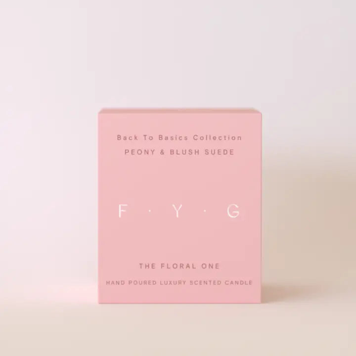 Pink box packaging for Peony & Blush Suede F.Y.G luxury scented candle with minimalist text design