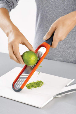 Handi-Grate 2-in-1 Mini Grater and Slicer for kitchen use, compact design - available at Keans Claremorris