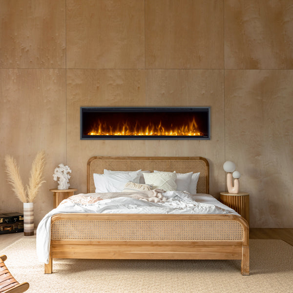 Dimplex Ignite Evolve 60" frameless electric fireplace mounted above a bed in a modern bedroom setting