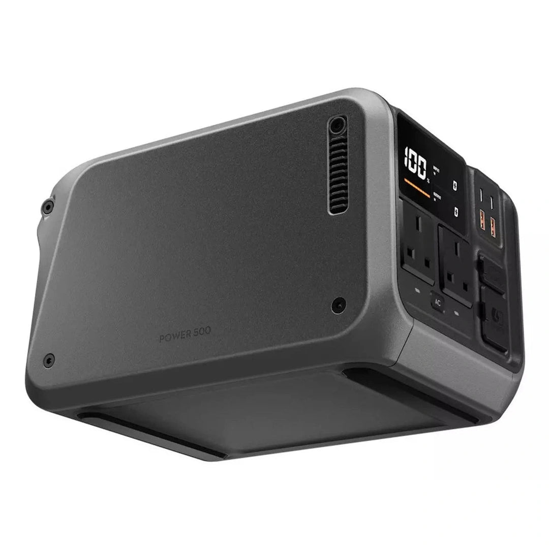 DJI Power 500 Portable Power Station angled view showing outlets, USB ports, and digital display at 100% charge.
