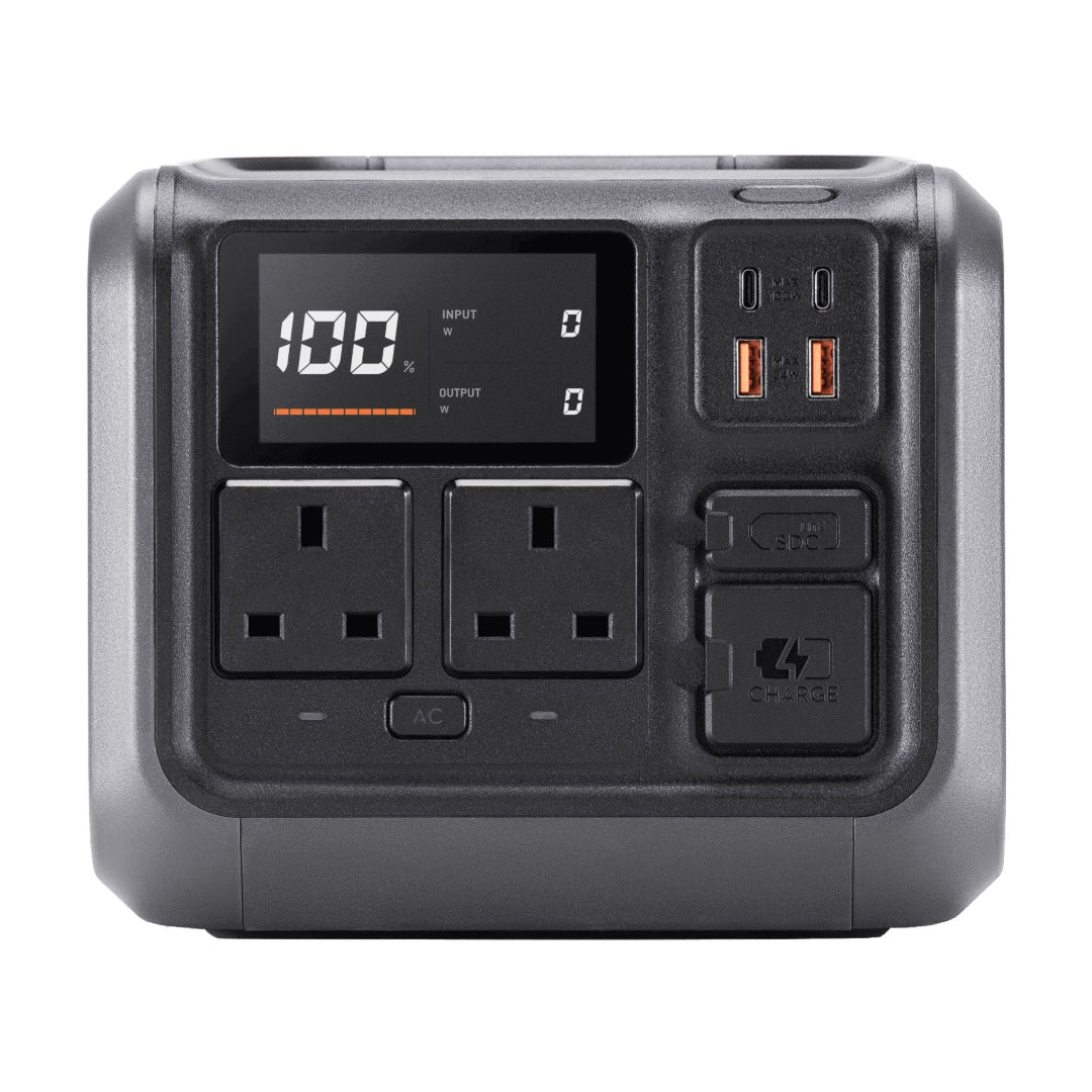 Front view of DJI Power 500 Portable Power Station showing display, two UK outlets, USB-C ports, and covered charging ports.
