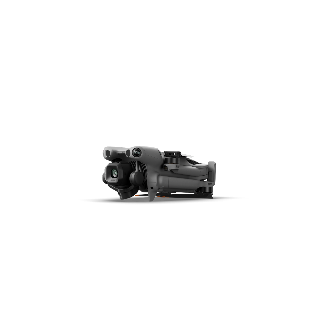 DJI Mini 5 Pro drone folded, shown from front-left angle with camera and sensors visible