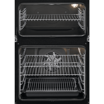 Electrolux built-in double oven in black with open doors showing wire racks and self-clean liners inside