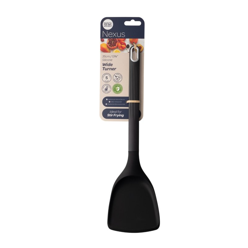 Black silicone solid wide turner with ribbed handle and packaging card showing product details.