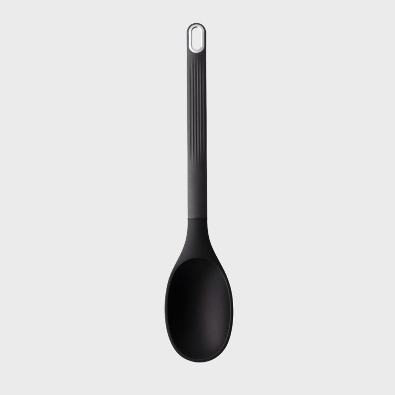 Black silicone solid spoon with a long handle and hanging hole, shown from above on a light background.